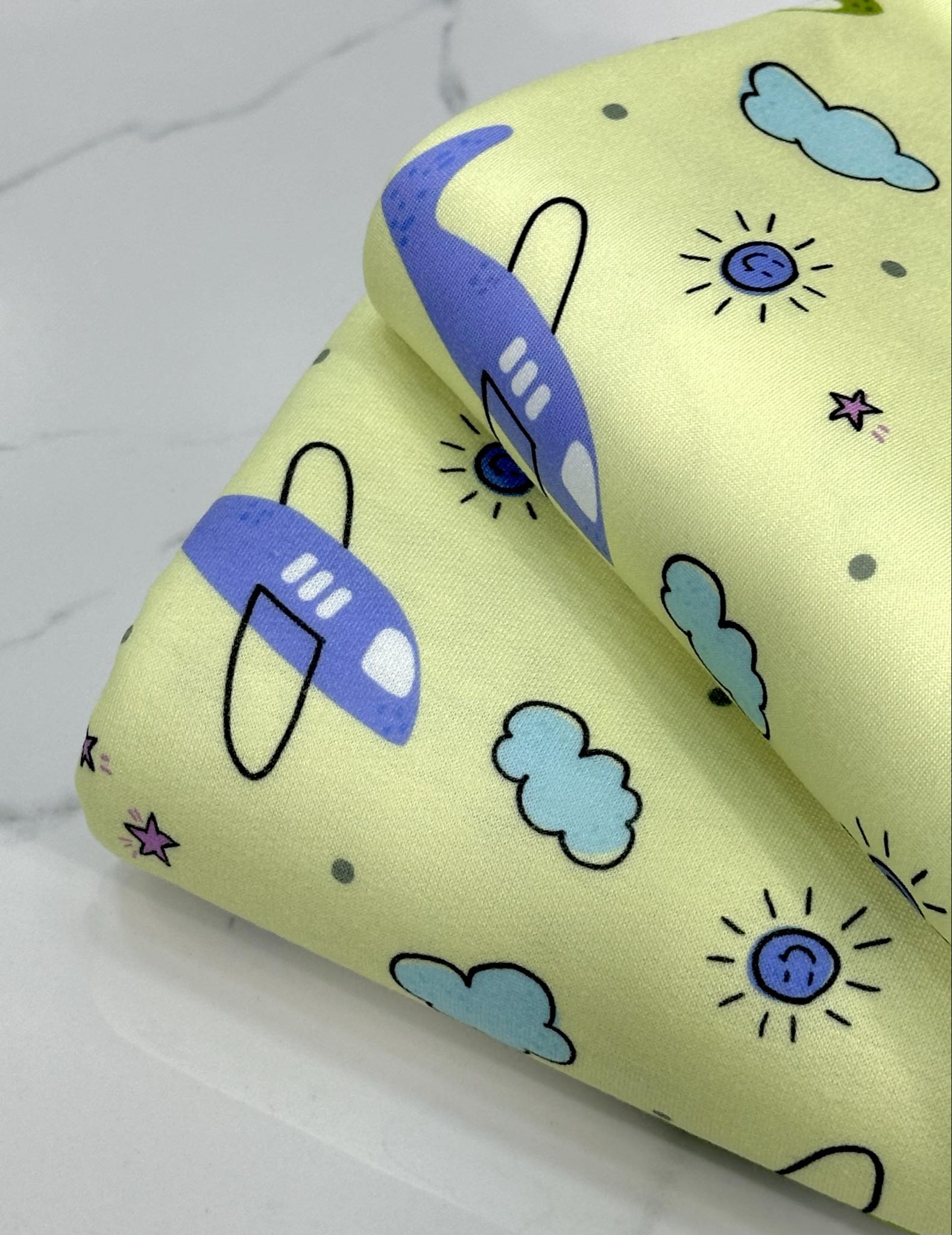 (DBP) PLANES AND CLOUDS ON LIGHT GREEN