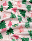(4X2 RIB) PINK AND GREEN CHRISTMAS TREES WITH OFF WHITE BOWS ON LIGHT PINK