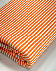 (KNIT) ORANGE AND OFF WHITE THIN STRIPES