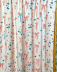 (SWIM) FLOWERS AND BOWS PATTERN ON CREAM