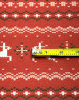 (SWEATER KNIT) OFF WHITE REINDEERS AND OFF WHITE POINSETTIA'S ON RED