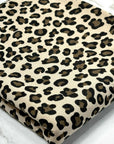 (FRENCH TERRY) BROWN AND BLACK CHEETAH ON TAUPE
