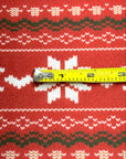 (SWEATER KNIT) OFF WHITE REINDEERS AND OFF WHITE POINSETTIA'S ON RED
