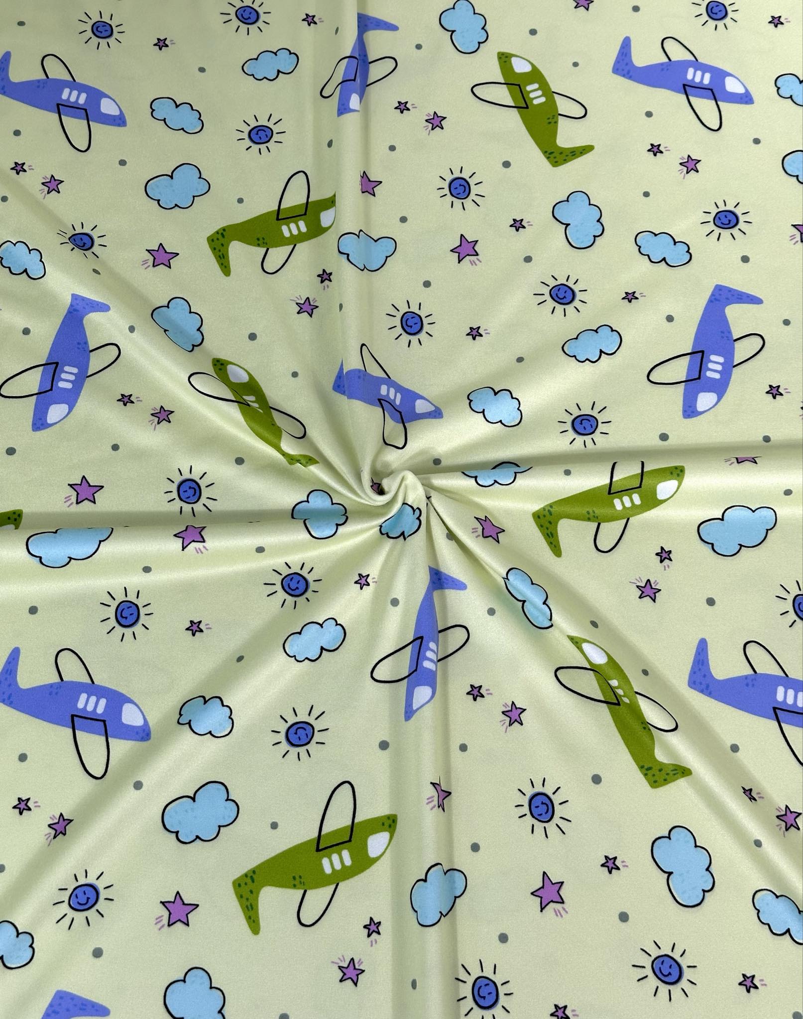 (DBP) PLANES AND CLOUDS ON LIGHT GREEN