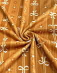(4X2 RIB) FLOWER AND OFF WHITE BOWS PATTERN ON APRICOT