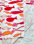 (COTTON BABY RIB) PINK, ORANGE AND RED FISH ON OFF WHITE