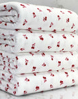(POINTELLE RIB) TINY RED CHERRIES WITH BOWS ON OFF WHITE