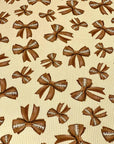 (4X2 RIB) FOOTBALL BOWS ON TAN