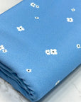 (CREPE KNIT) TINY WHITE FLOWERS ON BLUE