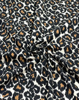 (COTTON JERSEY) BLACK AND CAMEL CHEETAH ON TAN