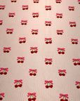 (2X2 BRUSHED RIB) CHERRY HEART WITH BOWS ON BLUSH