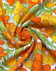 (WOVEN) ORANGE AND TANGERINE FLOWERS ON OFF WHITE