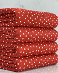 (OAKLEY) TINY OFF WHITE POLKA DOTS ON RED