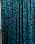 (DBP) BLACK CHEETAH ON TEAL