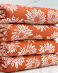 (RAYON MODAL) OFF WHITE SUNFLOWERS ON DARK ORANGE