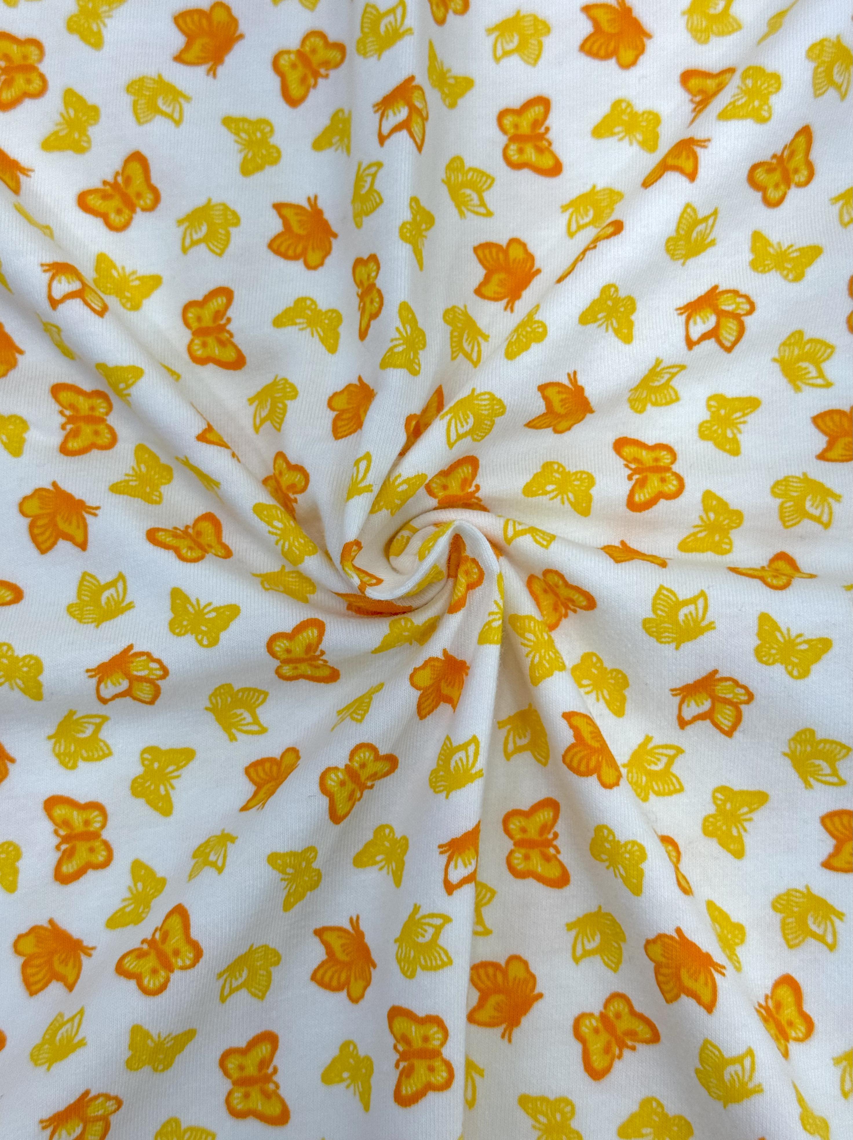 (COTTON SPANDEX) SMALL YELLOW AND ORANGE BUTTERFLIES ON OFF WHITE