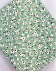 (EYELET) WHITE AND CEMENT SMALL FLOWER ON SAGE (1)