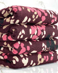 (HACCI SWEATER KNIT) PINK, IVORY, AND BLACK LEOPARD ON BURGUNDY