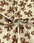 (4X2 RIB) FOOTBALL BOWS ON TAN