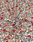 (DBP) CORAL, ORANGE, AND RED FLOWERS ON OFF WHITE