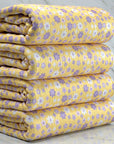 (POINTELLE RIB) LAVENDER, LILAC, AND OFF WHITE TINY FLOWERS ON SOFT YELLOW (1)