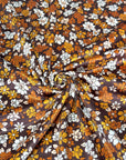 (VELVET) ORANGE AND OFF WHITE FLOWERS ON DARK BROWN