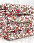 (DBP) CORAL, ORANGE, AND RED FLOWERS ON OFF WHITE