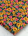 (TECHNO CREPE) BRIGHT PINK AND MUSTARD FLOWERS ON BLACK