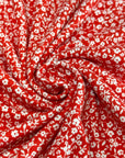 (DBP) TINY OFF WHITE FLOWERS ON RED(1)