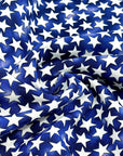 (COTTON) TINY WHITE STARS ON ROYAL BLUE