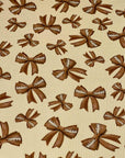 (4X2 RIB) FOOTBALL BOWS ON TAN