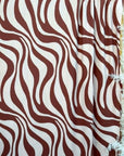 (WIDE RIB) BROWN SWIRLS ON TAN