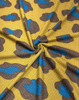 (WAFFLE) TEAL AND BROWN CHEETAH ON MUSTARD