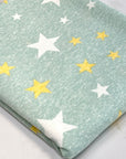 (FRENCH TERRY) YELLOW AND OFF WHITE STARS ON VINTAGE GREEN