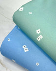 (CREPE KNIT) TINY WHITE FLOWERS ON BLUE