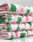 (4X2 RIB) PINK AND GREEN CHRISTMAS TREES WITH OFF WHITE BOWS ON LIGHT PINK