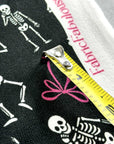 (OAKLEY) SKELETONS AND PINK BOWS ON BLACK