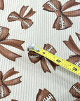 (4X2 RIB) FOOTBALL BOWS ON TAN