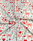 (2X2 BRUSHED RIB) HEARTS, BOWS, FLOWERS, AND RED BIRDS ON OFF WHITE