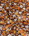 (VELVET) ORANGE AND OFF WHITE FLOWERS ON DARK BROWN