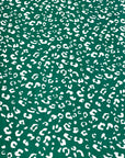 (DBP) TINY WHITE LEOPARD ON HUNTER GREEN