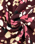 (HACCI SWEATER KNIT) PINK, IVORY, AND BLACK LEOPARD ON BURGUNDY