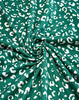 (DBP) TINY WHITE LEOPARD ON HUNTER GREEN