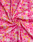 (POINTELLE RIB) YELLOW, PINK, AND OFF WHITE TINY FLOWERS ON PINK