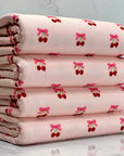 (2X2 BRUSHED RIB) CHERRY HEART WITH BOWS ON BLUSH