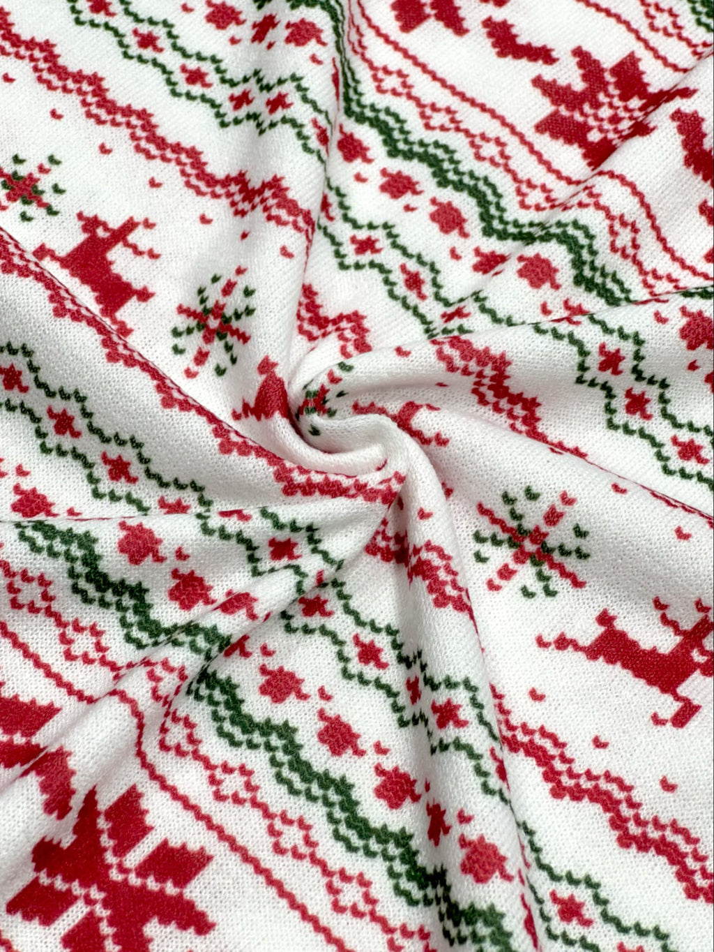 (SWEATER KNIT) RED REINDEERS AND RED POINSETTIA'S ON OFF WHITE