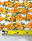 (TRIM) EMBROIDERED TANGERINE AND MUSTARD FLOWERS