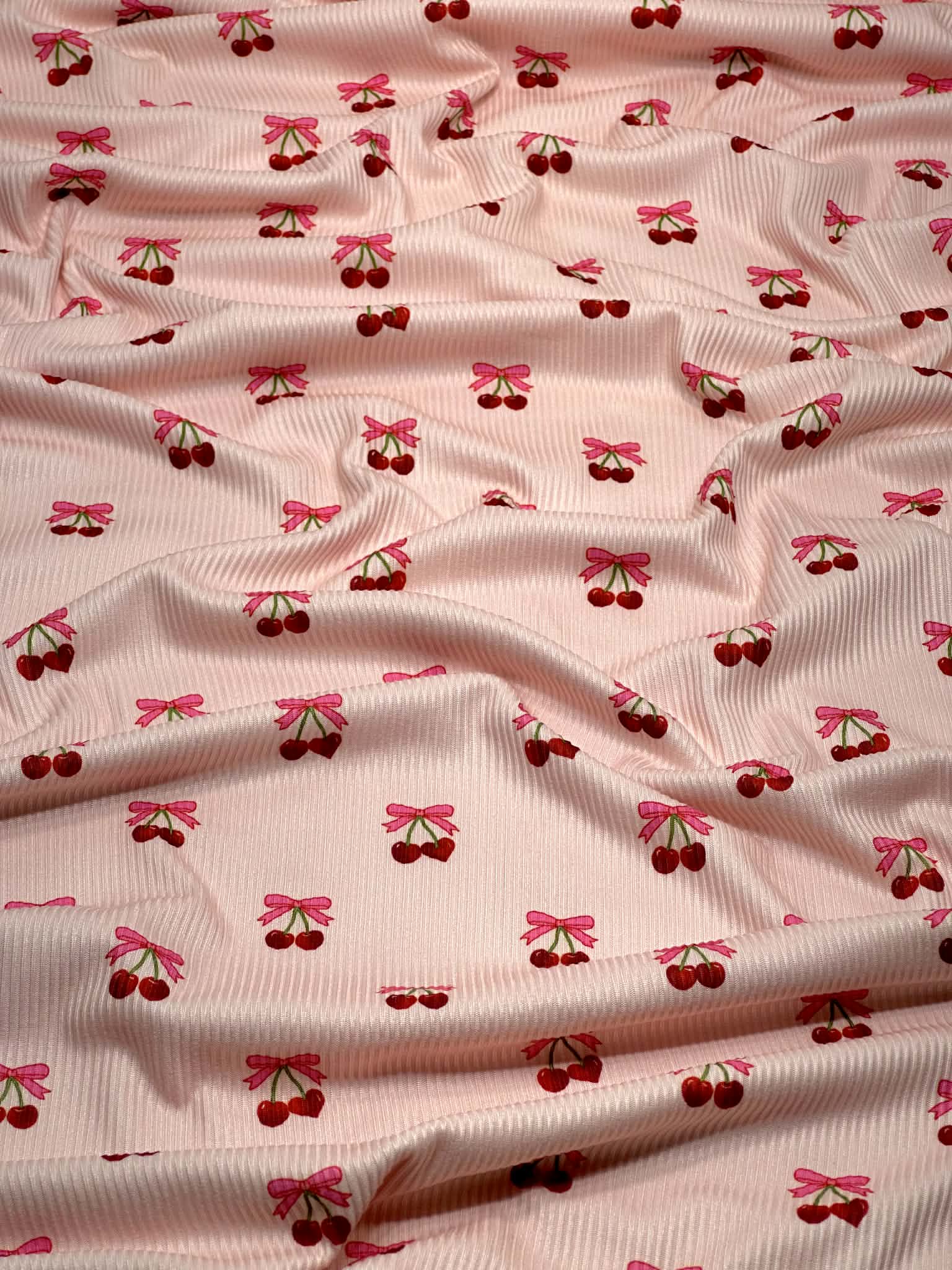 (2X2 BRUSHED RIB) CHERRY HEART WITH BOWS ON BLUSH