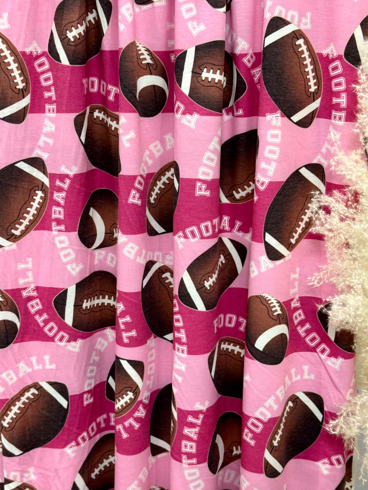 (FRENCH TERRY) FOOTBALLS ON PINK STRIPE PATTERN