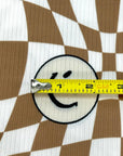 (YUMMY RIB) CREAM HAPPY FACES ON LIGHT BROWN CHECKERED WAVE